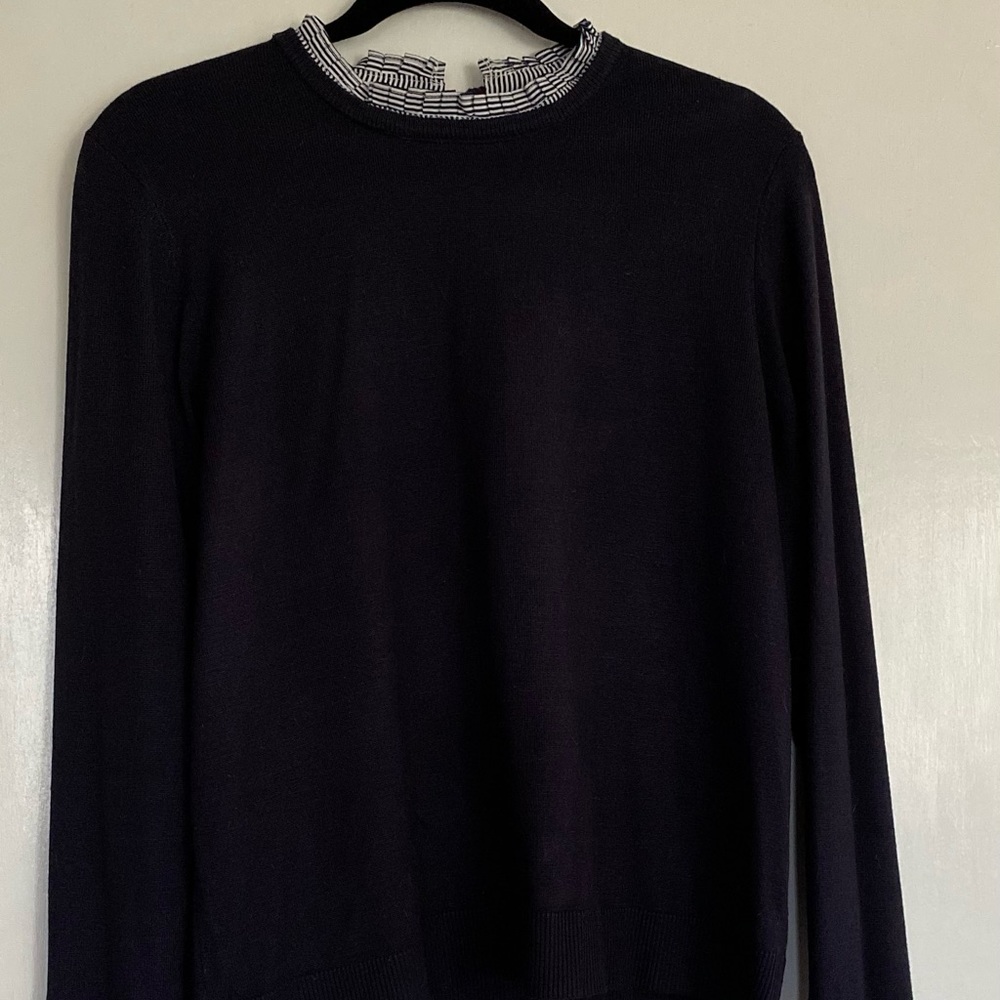 Pretty navy sweater with blue white stripe collar at neck and cuffs